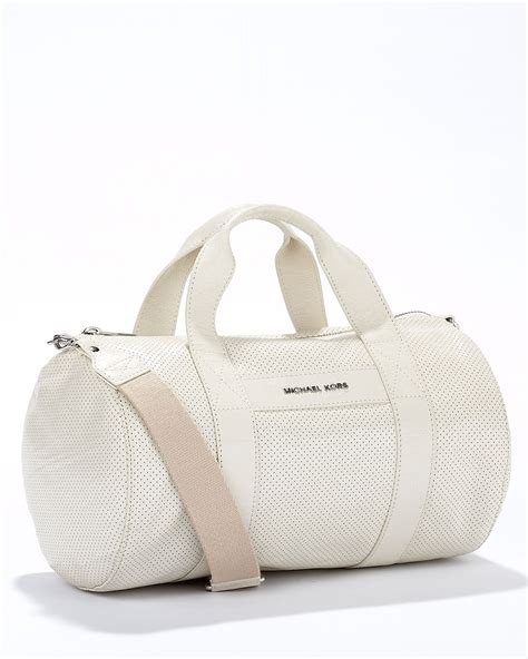 michael kors white duffle bag|michael kors large suitcase.